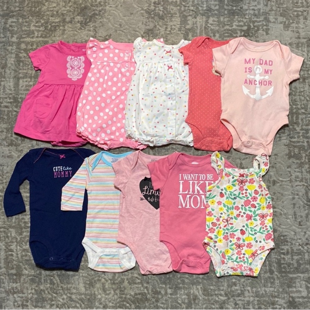Bundle of 10 baby girls onesies and rompers. Size 3-6 month.
